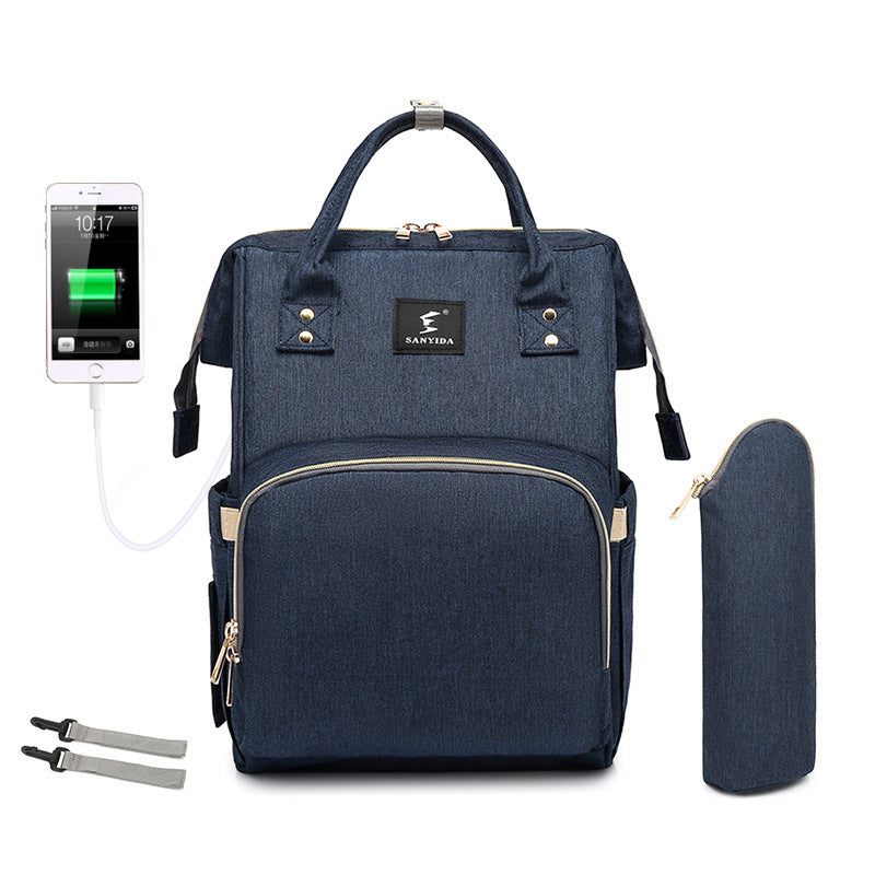 The All-in-One Travel Diaper Bag with Foldable Crib & Changing Station