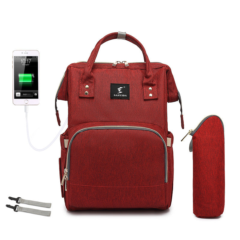 The All-in-One Travel Diaper Bag with Foldable Crib & Changing Station