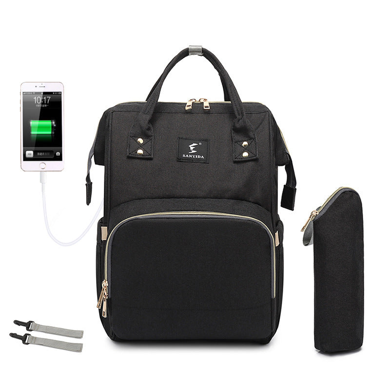 The All-in-One Travel Diaper Bag with Foldable Crib & Changing Station