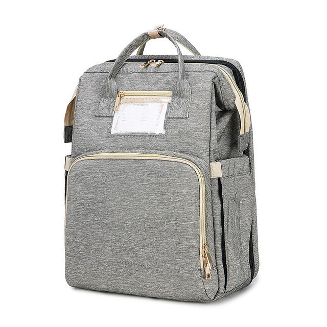 The All-in-One Travel Diaper Bag with Foldable Crib & Changing Station