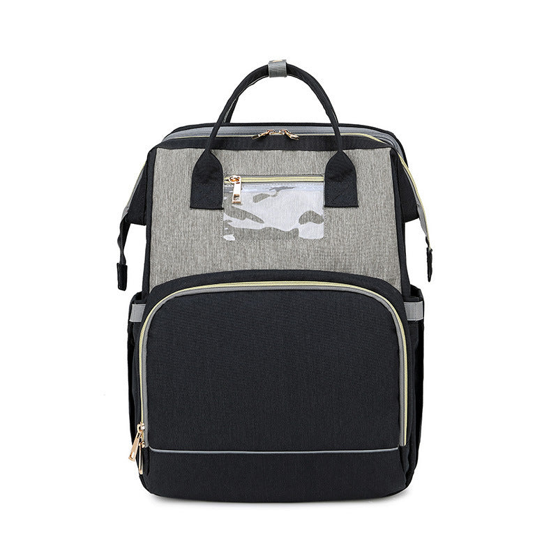 The All-in-One Travel Diaper Bag with Foldable Crib & Changing Station