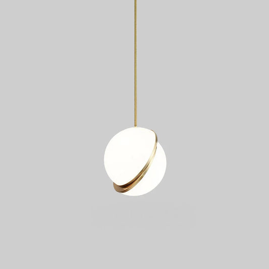 Modern pendant light with white shade and gold rim on a gray background