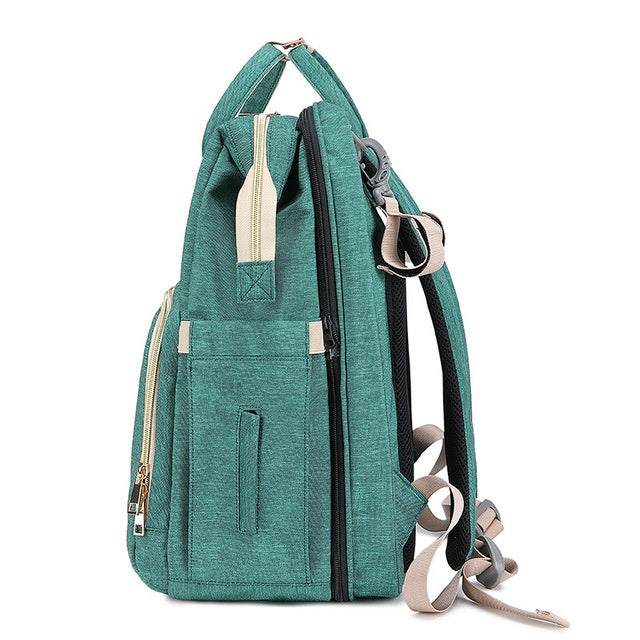 The All-in-One Travel Diaper Bag with Foldable Crib & Changing Station
