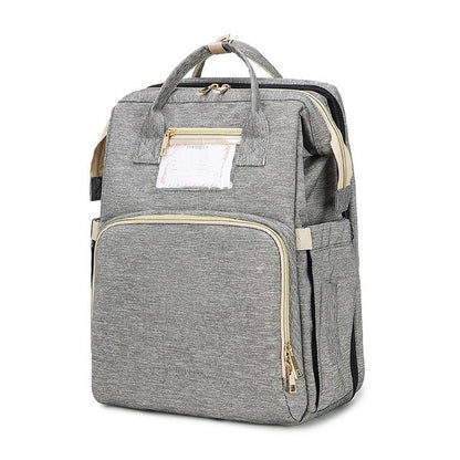 The All-in-One Travel Diaper Bag with Foldable Crib & Changing Station