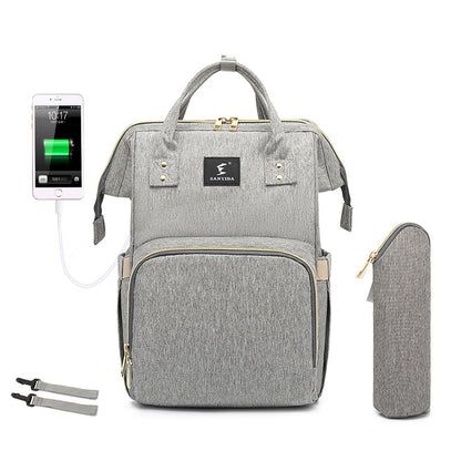 The All-in-One Travel Diaper Bag with Foldable Crib & Changing Station